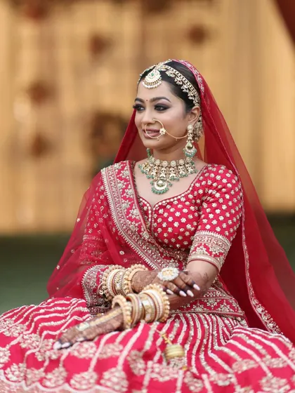 This bride is ready for her big moment. The makeup is set to perfection to ensure it stays in place from the walk down the aisle to the final farewell.