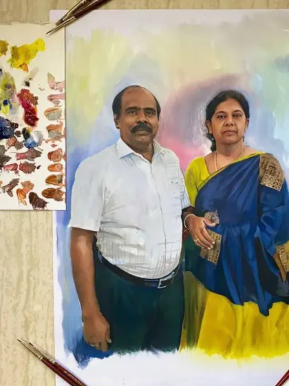 This portrait of a couple shows the finished artwork alongside my color palette. It gives a small peek into the process of mixing the exact right shades to bring skin tones and clothing to life.
