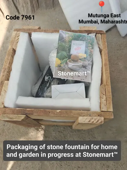 The packing of a stone fountain for a home and garden in progress.