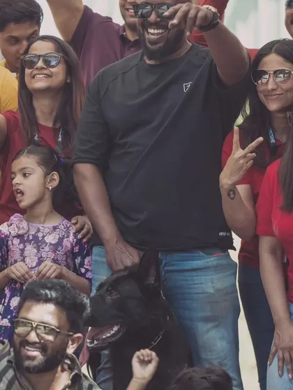A happy crowd, with my German Shepherd calmly sitting amidst the excitement. This is what a stable temperament looks like.