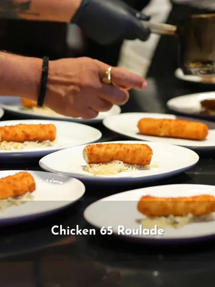 The Chicken 65 Roulade plated and ready to be served. This dish was part of a multi-course experience inspired by the diverse cuisines of India.