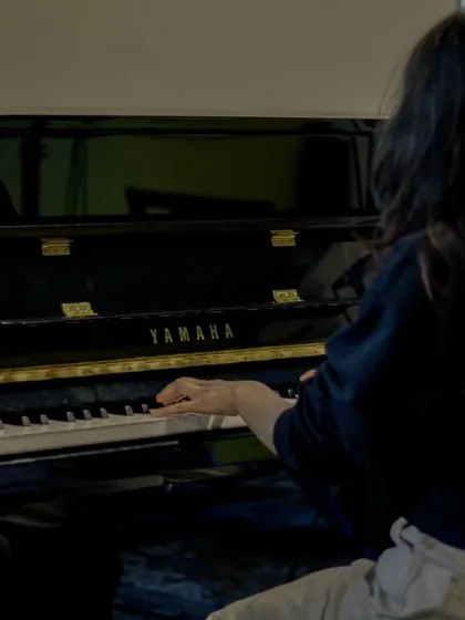A student lost in the music at our Yamaha piano. These quiet moments of practice are where dedication turns into artistry.