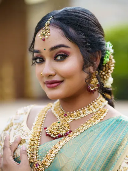 The complete South Indian bridal look, featuring a beautiful hairstyle with fresh flowers. My students learn to perfect every element of a bride's appearance.