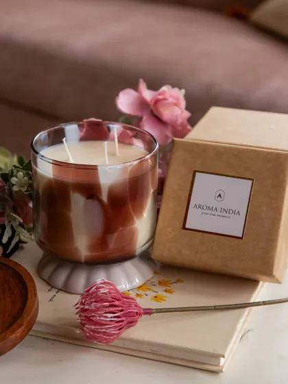 A closer look at our Oud & Bergamot candle, featuring a sophisticated pattern in a neutral palette. This two-wick soy candle is a perfect gift, offering a warm and inviting fragrance in an elegant glass vessel.
