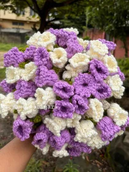The full "bouquet" view of our crochet baby blanket. It looks like a stunning floral arrangement but is actually a cozy blanket, making it a truly unique and memorable baby shower gift.