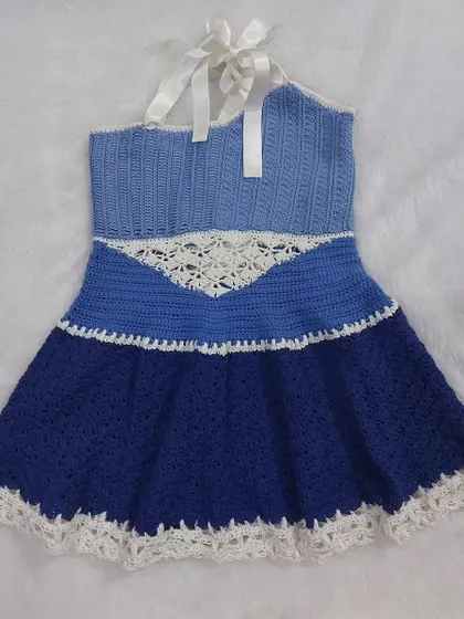 This version of the Aviva Dress features a different lace panel design, showing how the pattern can be customized.