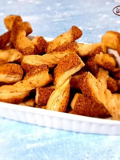 Our Cheese Straws are a simple pleasure. Made with puff pastry and loaded with cheese, they are baked until crispy and golden. They are a favorite for parties or just to nibble on.