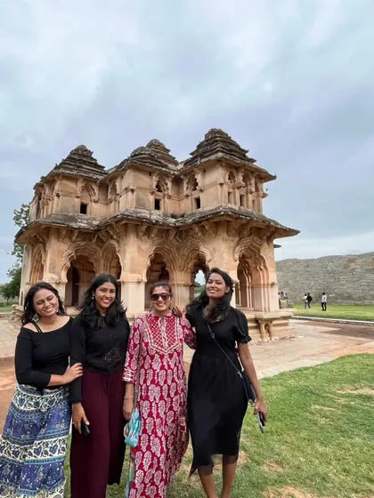 A group of women travelers at the Lotus Mahal in Hampi.