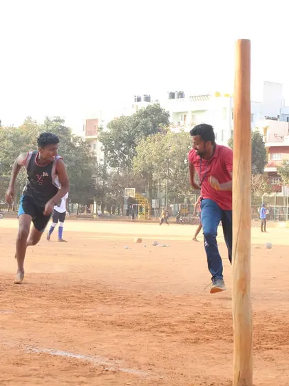 Teamwork in action. Even in a two-player chase, communication and strategy are key to winning the point.