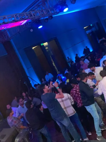 Capturing the moment from the middle of the dance floor. Everyone was having a blast.