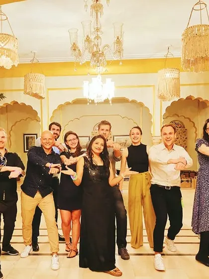 It's all smiles after a successful practice session with this wonderful group from Germany, London, and the USA. I specialize in creating fun, accessible Bollywood dance workshops for international wedding guests, ensuring everyone is ready for the main event.
