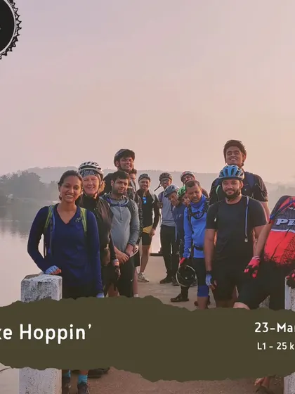 A group of smiling riders on a jetty during our 'Lake Hoppin'' tour. This ride is all about enjoying the scenery and the company.