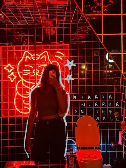A very cool neon bathroom selfie, with a white outline to make me stand out in the dark.