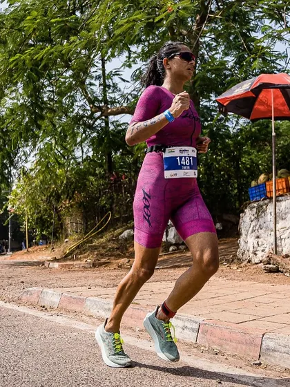 In the zone during the run leg of a triathlon. My experience as a multi-sport athlete gives me a unique perspective on coaching runners, especially those balancing other disciplines. We focus on efficiency and strength to perform well off the bike.