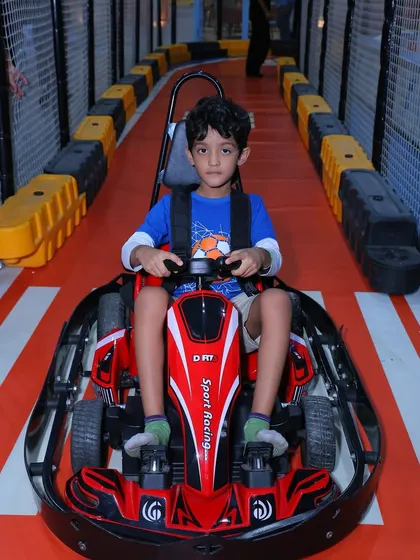 This young racer is focused and ready for the track. Our go-karts provide a real sense of independence and adventure for kids.