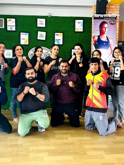 A group photo from our women's self-defense workshop. We believe self-defense is a state of mind that begins with the belief that you are worth defending.