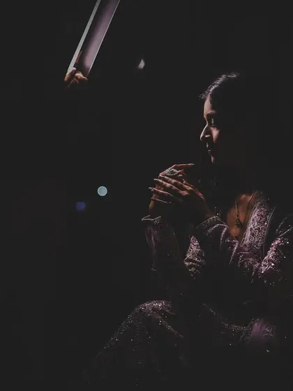 A minimalist and artistic silhouette of the bride-to-be, using shadows to create a sense of mystery and elegance.