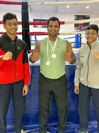 Me with my two silver medalists, Siddhesh and Riddhi. Their hard work and my guidance is a winning combination.