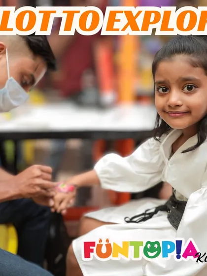 A little girl gets a temporary tattoo as part of the party activities. We offer add-ons like face painting and tattoos to keep all the little guests engaged and entertained.