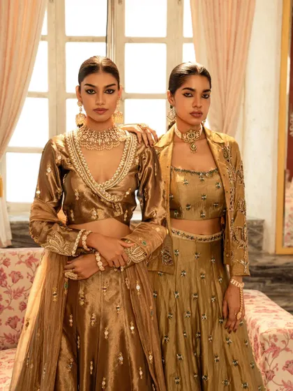 A powerful dual-model portrait for a brand campaign. The models' direct gaze and coordinated styling create a strong, cohesive image.