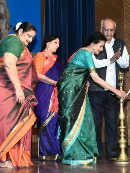 Lighting the lamp at the Delhi Tamil Sangam felicitation ceremony. This traditional gesture marks the auspicious beginning of an event and symbolizes the dispelling of darkness with the light of knowledge and art.