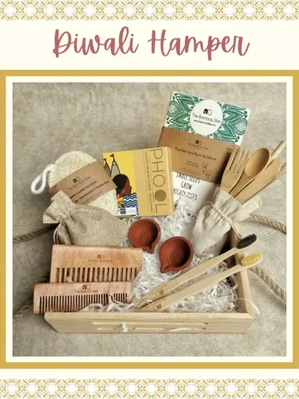 For an eco-conscious Diwali, I offer this sustainable hamper. It's filled with a bamboo toothbrush and cutlery set, a neem wood comb, natural loofah, and handmade clay diyas.