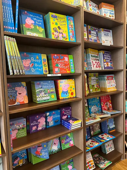 Another angle of our book collection, showcasing colorful board books and early readers perfect for toddlers and preschoolers.