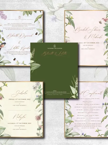 Fresh botanicals give this invitation suite a natural and organic elegance. The design features different arrangements of leaves and flowers on each card, creating a cohesive yet varied collection.