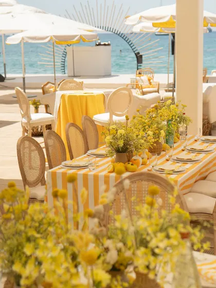 The dining setup was perfectly positioned to offer guests a beautiful view of the sea, blending the decor with the natural beauty of the French Riviera.