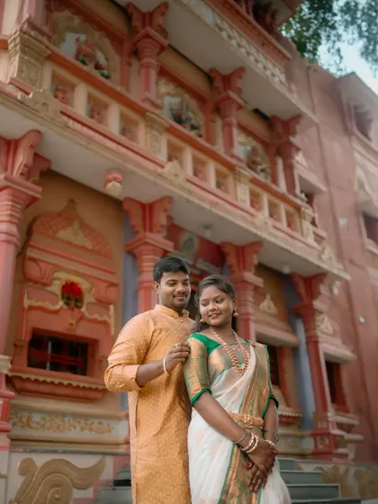 A portrait of the couple outside the temple, with its intricate architecture visible in the background. This shot captures both their connection and the beauty of the location.