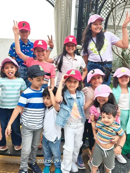 A group of happy kids showing off their personalised caps. We love seeing our creations bring so much joy.
