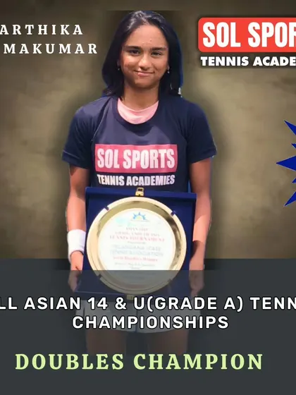 Celebrating Karthika Padmakumar's doubles championship win at the All Asian 14 & Under Tennis Championships. Our doubles training emphasizes strategy, communication, and net play to create winning partnerships.