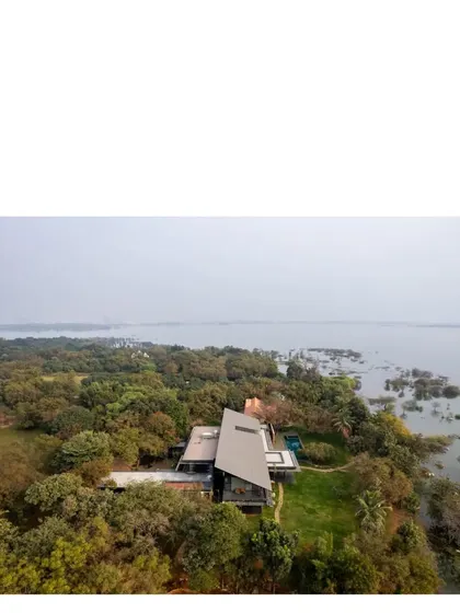 An aerial view of the Lakeshore house, showing how the structure sits on the edge of the water. We are fortunate to get sites like this to work on, where architecture can truly engage with a powerful natural landscape.