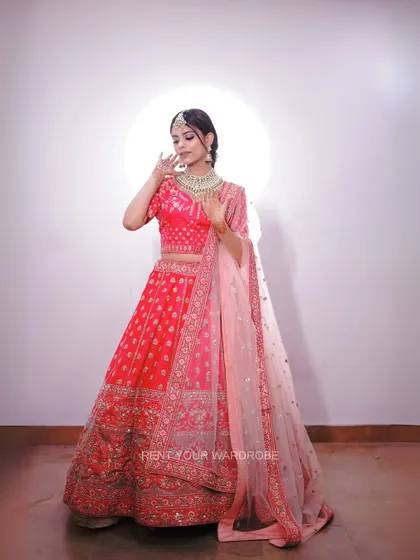 Another full-length shot of the pink lehenga, highlighting its beautiful twirl.
