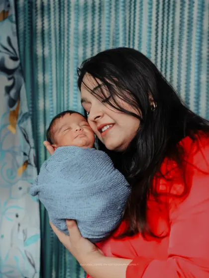 The world fades away in these moments. I focus on the intimate connection between a mother and her newborn, capturing the love in her eyes.
