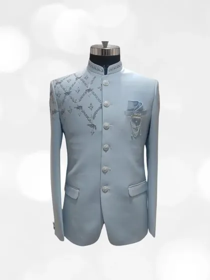 A light blue Jodhpuri suit from our exclusive pre-loved collection. The asymmetrical embroidery adds a modern touch to this classic silhouette, perfect for a wedding guest or groom.