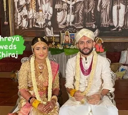 A portrait of a couple on their wedding day, dressed in classic attire that reflects our heritage. I personally guide families to ensure their wedding day is perfect.