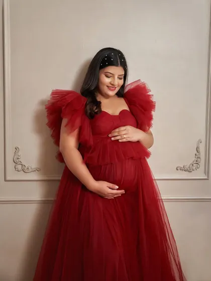 A detailed look at the bodice of the Lorna gown. The sweetheart neckline and layered ruffles are incredibly flattering and add a romantic touch.
