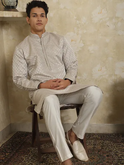 This light grey kurta with a subtle geometric print is another one of my stylish options for summer occasions, keeping you cool while looking sharp.