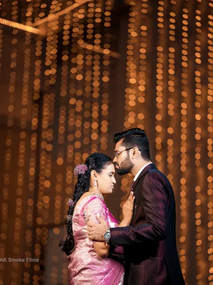 A romantic portrait from a Pollachi wedding, with a backdrop of beautiful bokeh lights creating a magical atmosphere.