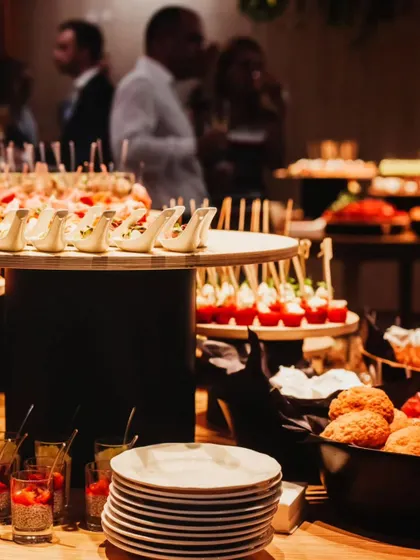 Another view of our appetizer station, showing the variety and abundance we offer. From spooned canapés to pastries, we ensure there is something for everyone.