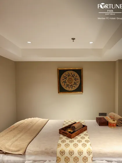 This is one of my private treatment rooms, prepared for your individual session. The minimalist decor and tranquil ambiance ensure your focus remains entirely on your relaxation and rejuvenation.