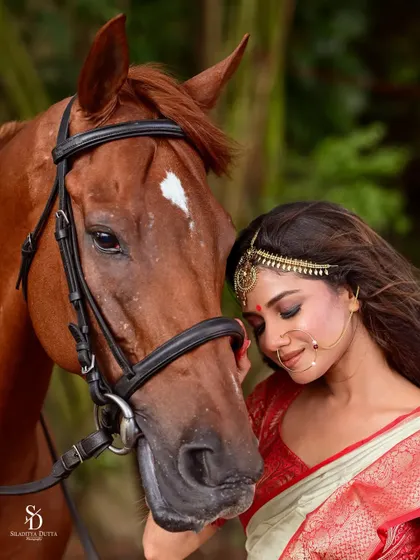 An intimate moment between Sauraseni and the horse. This gentle and emotional shot adds a layer of softness and narrative to the high-fashion editorial.
