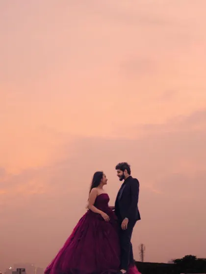 Another stunning silhouette of the couple against a pastel sunset. These are the timeless, romantic images that you will treasure forever.