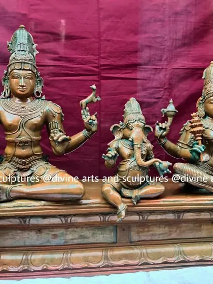 Another view of the antique-finished Shiva Parivaram. This angle shows the loving interaction between the divine family members, a central theme in Shaiva tradition.