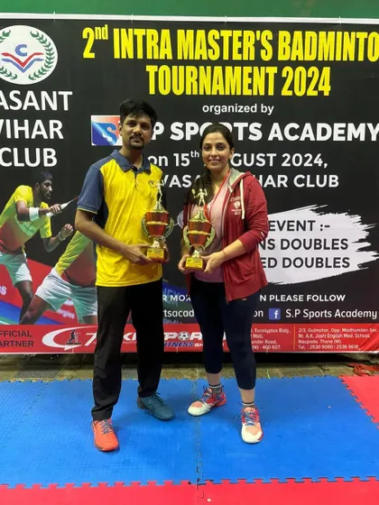 Mixed Doubles Group A & B winners and runners-up.