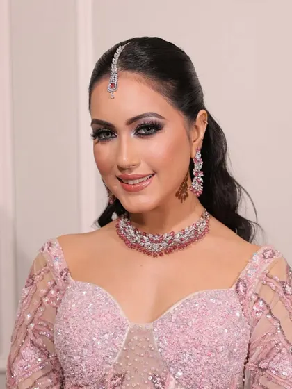 Soft glow, timeless beauty. This engagement look in a pink sequined gown is perfect for a modern bride who wants to look effortlessly elegant.