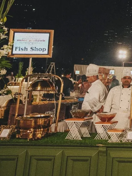 A wide view of our 'Fish Shop' counter at a large nighttime event. The setup is both functional and thematic, adding to the overall experience.