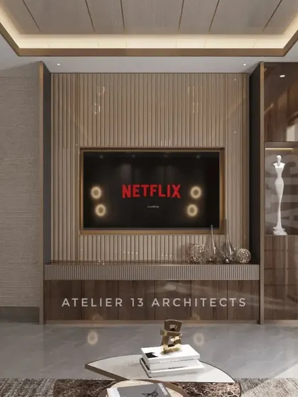 This custom TV unit was designed to reflect the client's persona, using a combination of fluted veneer, leather, glass, and metal. It’s a functional piece that doubles as a work of art.