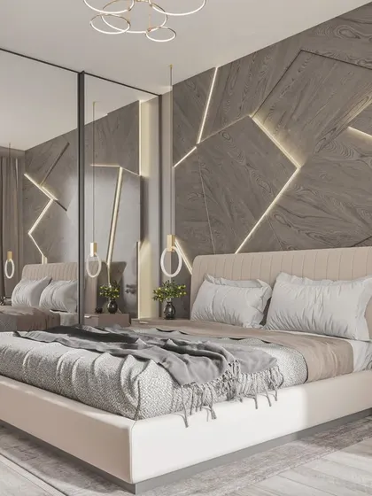 This modern bedroom features a unique geometric accent wall with backlighting, creating a dynamic and stylish focal point that reflects a contemporary urban lifestyle.